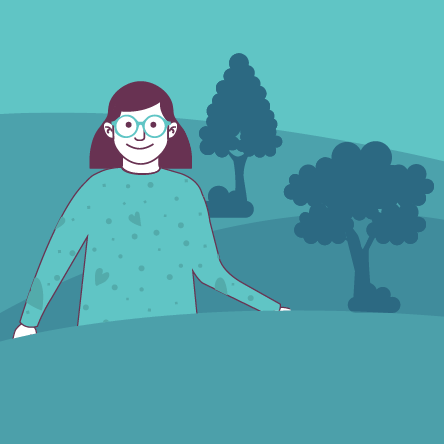 Esta es una imagen. En la imagen se observa un cuadrado color azul, en donde aparece una joven de cabello corto, con lentes y un suéter con dibujos de corazones. Está en un de parque con árboles detrás de ella.